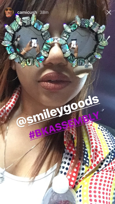 Picture - Model in Abalone Mirrored sunglasses from Smiley Art Goods  - Link to Abalone Round Sunglasses